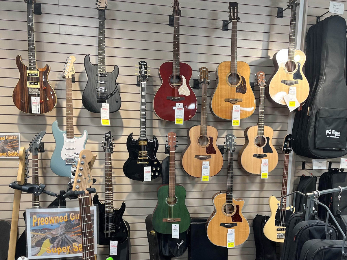 Pre-Owned Acoustic & Acoustic-Electric Guitars - Ray's Midbell Music